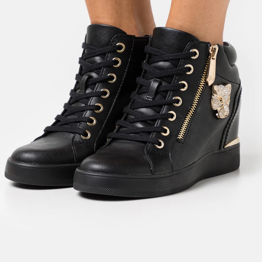 ALDO aloivu sz 7.5. NEW never worn. black heeled bedazzled sneakers.